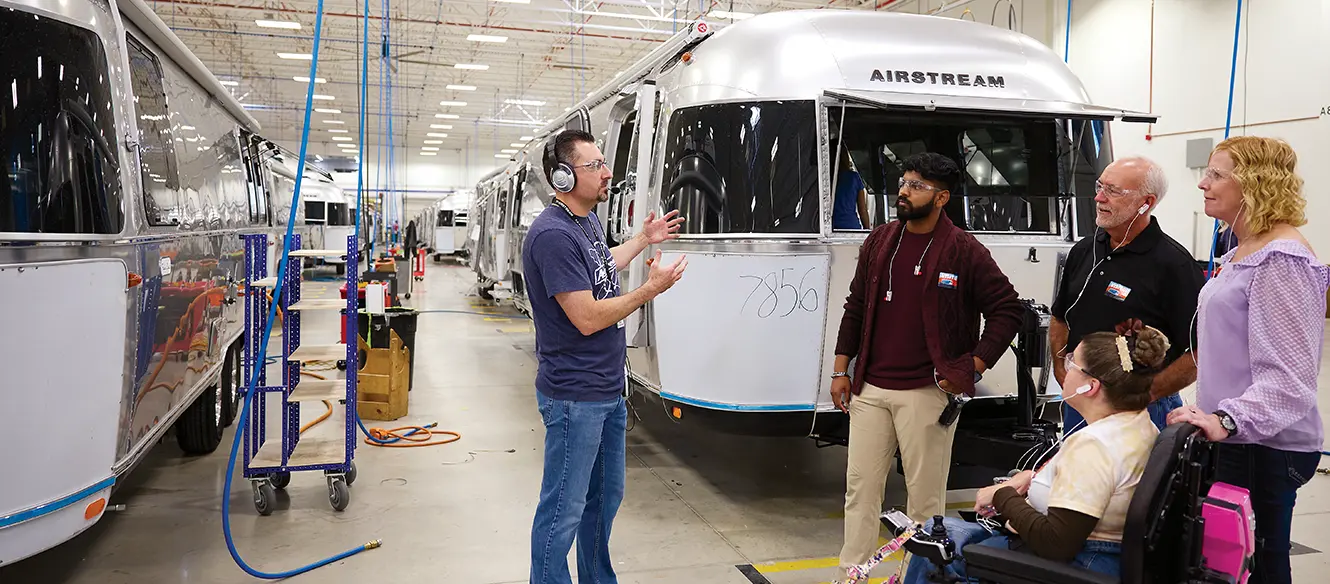 tourist visiting airstream